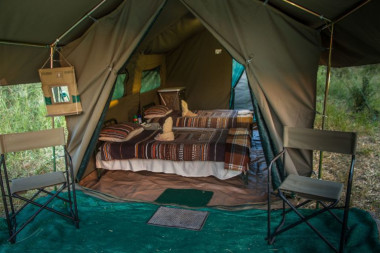 Mobile safari interior of tent with bed Botswana Safari